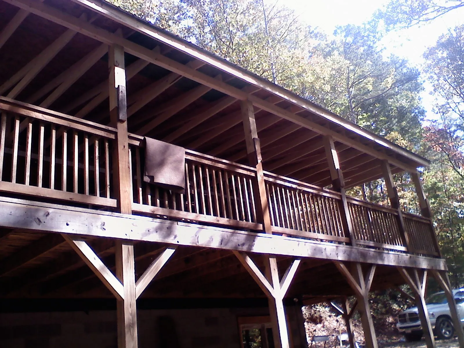 Timber framing under a new elevated porch and deck — Roof Leak Repair in Mona by Roofing Brothers